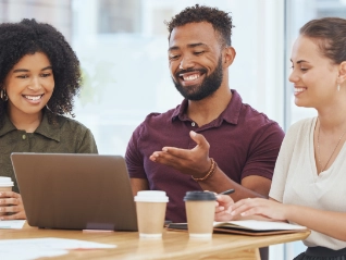 people having a conversation at a table 