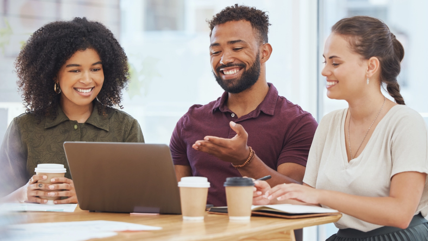 people having a conversation at a table 