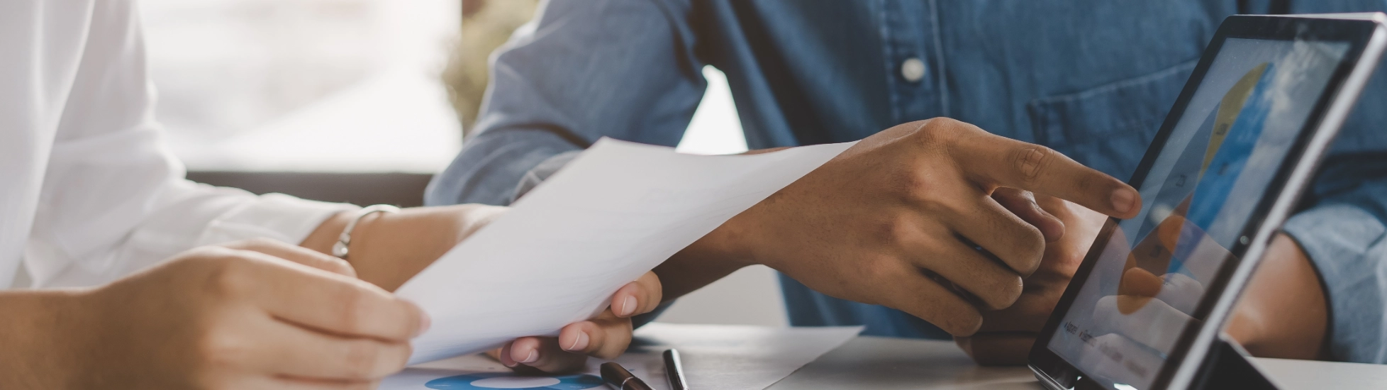 business meeting looking at data and discussing